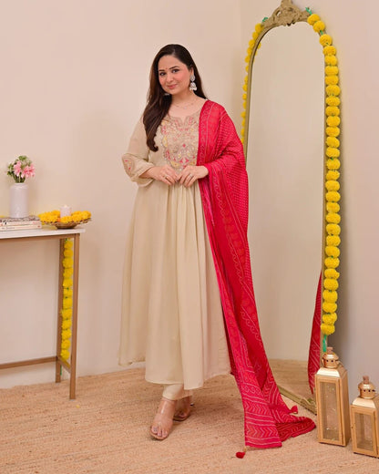 Women's Elegant Beige Embroidered Anarkali Kurta Set with Pink Bandhani Dupatta